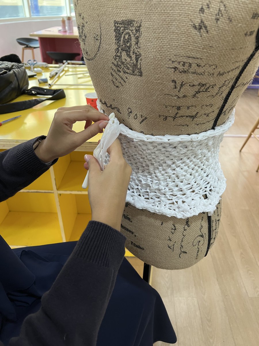 AIS_VisualArts's tweet photo. Our grade 11 student, Mahra, is crocheting a dress from recycled plastic, she is highlighting the detrimental impact that plastic have on the environment. #AISVisualArts #AISGrade11 #AISSrSecondary https://t.co/gtqG8kyJCB