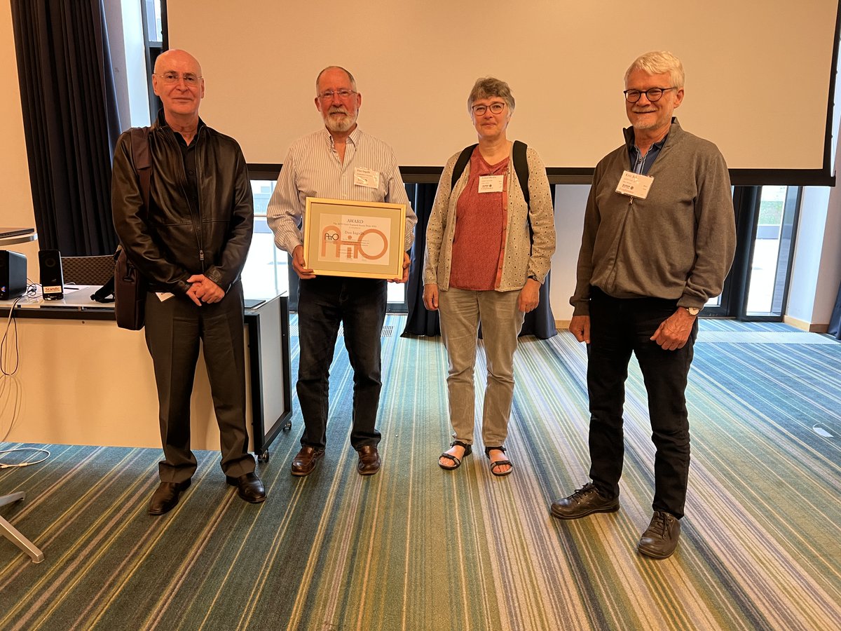Dan Ingalls gave a brilliant talk accepting his much deserved Dahl-Nygaard award. Here he is holding the award, with Gorel Hedin, Erik Jul and (oddly enough), yours truly.