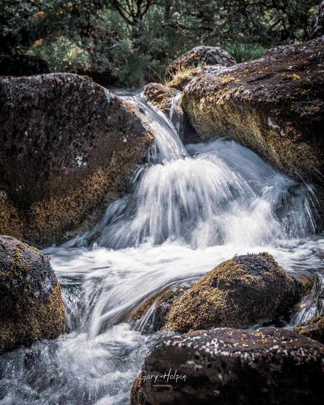 One thing I love to do is to use ND filters to play with water motion - just a small change in shutter speed makes a huge difference in the look of the water. Here's one from a trip to Dartmoor yesterday. This one was taken at 1/10th second...