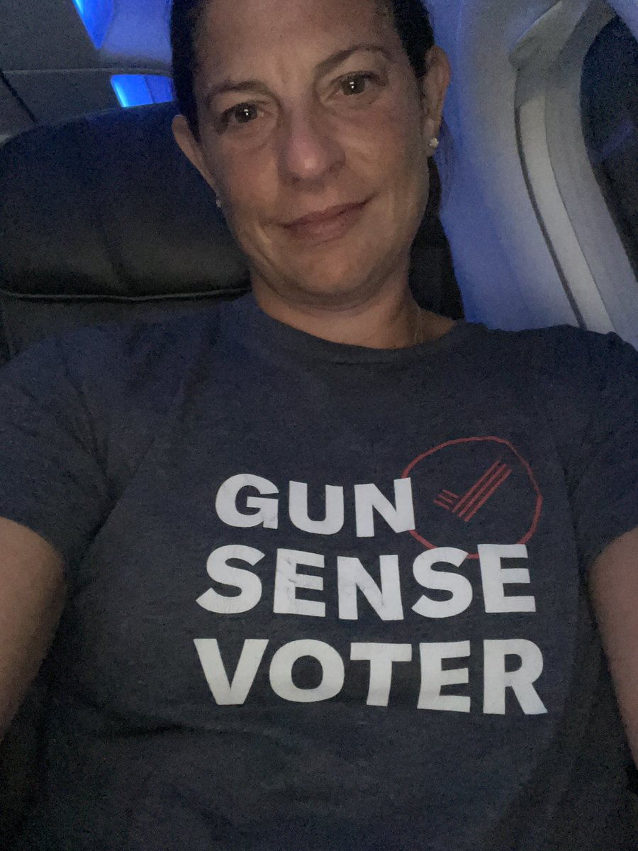 Proud <a href="/MomsDemand/">Moms Demand Action</a> volunteer here. Wearing my #gunsensevoter shirt on a plane because we won’t give up. #KeepGoing