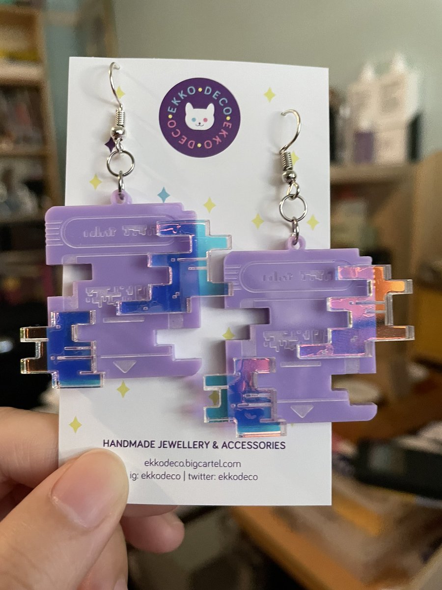 ekkodeco's tweet photo. Look at these really cool holographic glitch earrings!! One of our newest designs these are going to be debuting at SMASH! 💕 https://t.co/wQmZZnagp6