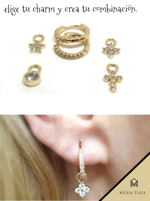 En @kirola_malaga  tienes lo último en accesorios y a cada cuál más bonito. Como estos aros de plata de ley bañados en oro diseñados de forma reversible con #circonitas por uno de los lados. Además, llevan cuatro pequeños #charms  :)