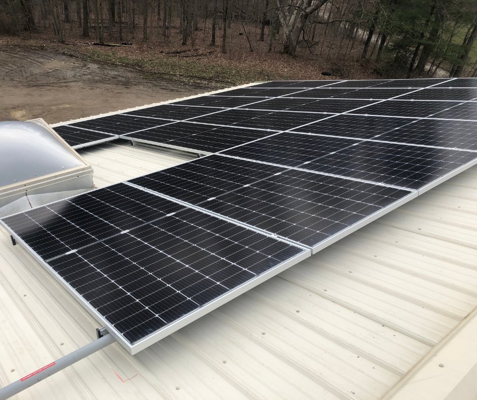 EISSolar's tweet photo. We enjoyed the extra “help” from our dog friend while installing this roof mount installation for Clarion River Organics. It includes 71 VSUN 410W bifacial panels. It is expected to produce approximately 36,410 kW. #EISSolar #ClarionRiverOrganics #NEWSolar #HarvestTheSun https://t.co/3PHkrpRVDA