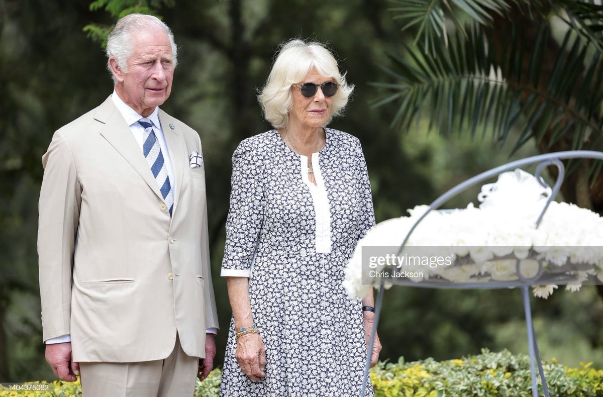 ChrisJack_Getty's tweet photo. A poignant moment of reflection for The Prince of Wales and The Duchess of Cornwall as they lay a wreath at the Kigali Genocide Memorial in Rwanda today 🇷🇼 https://t.co/8PrGvdp7FG