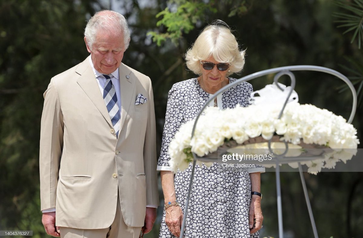 ChrisJack_Getty's tweet photo. A poignant moment of reflection for The Prince of Wales and The Duchess of Cornwall as they lay a wreath at the Kigali Genocide Memorial in Rwanda today 🇷🇼 https://t.co/8PrGvdp7FG
