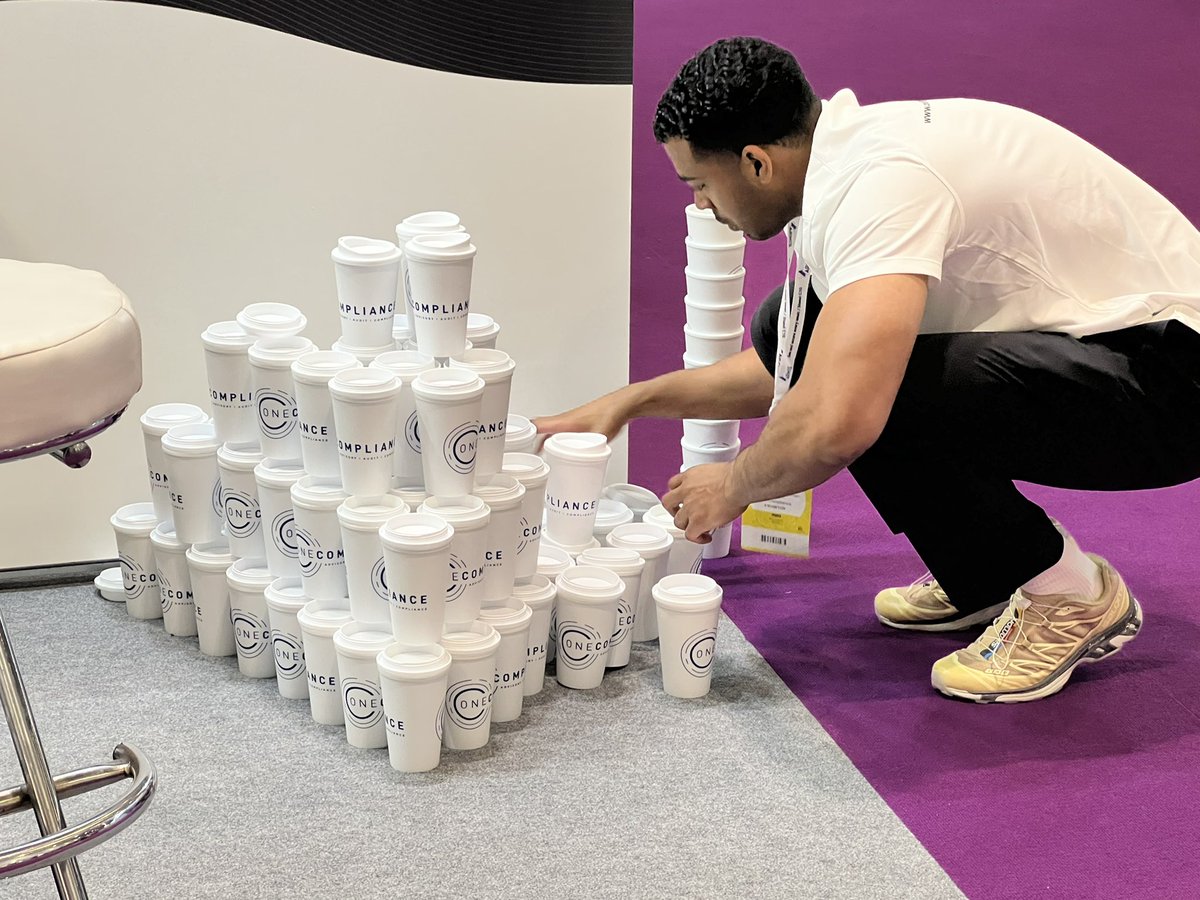 One_Compliance's tweet photo. Morgan rebuilt the Tower of Power after an overnight vacuum cleaner incident. #Infosec2022 https://t.co/DR08I0DDsE