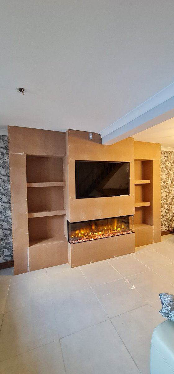 CarnCarpentry's tweet photo. Media wall with built in fire, to and storage to sides 🛠🔨🪚🪛 https://t.co/yQMePENyct