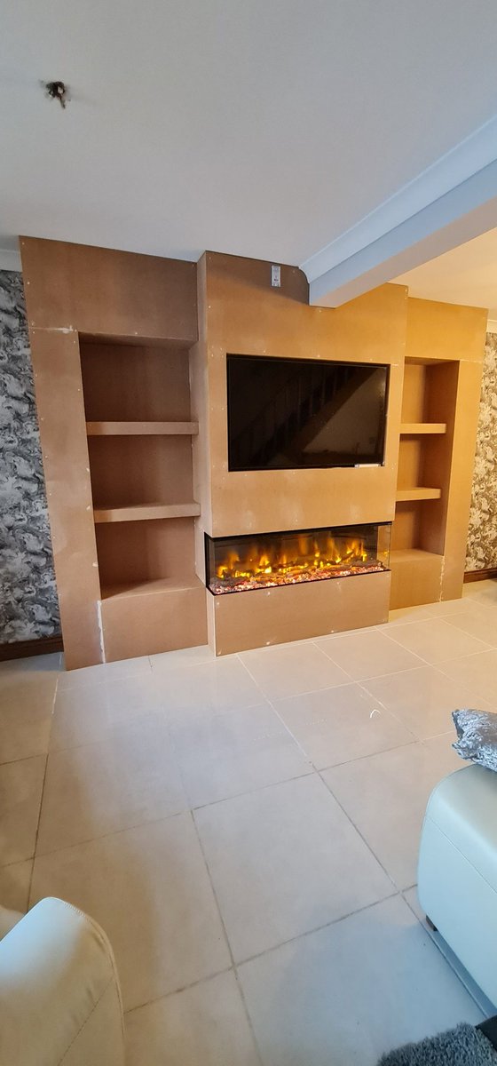 CarnCarpentry's tweet photo. Media wall with built in fire, to and storage to sides 🛠🔨🪚🪛 https://t.co/yQMePENyct