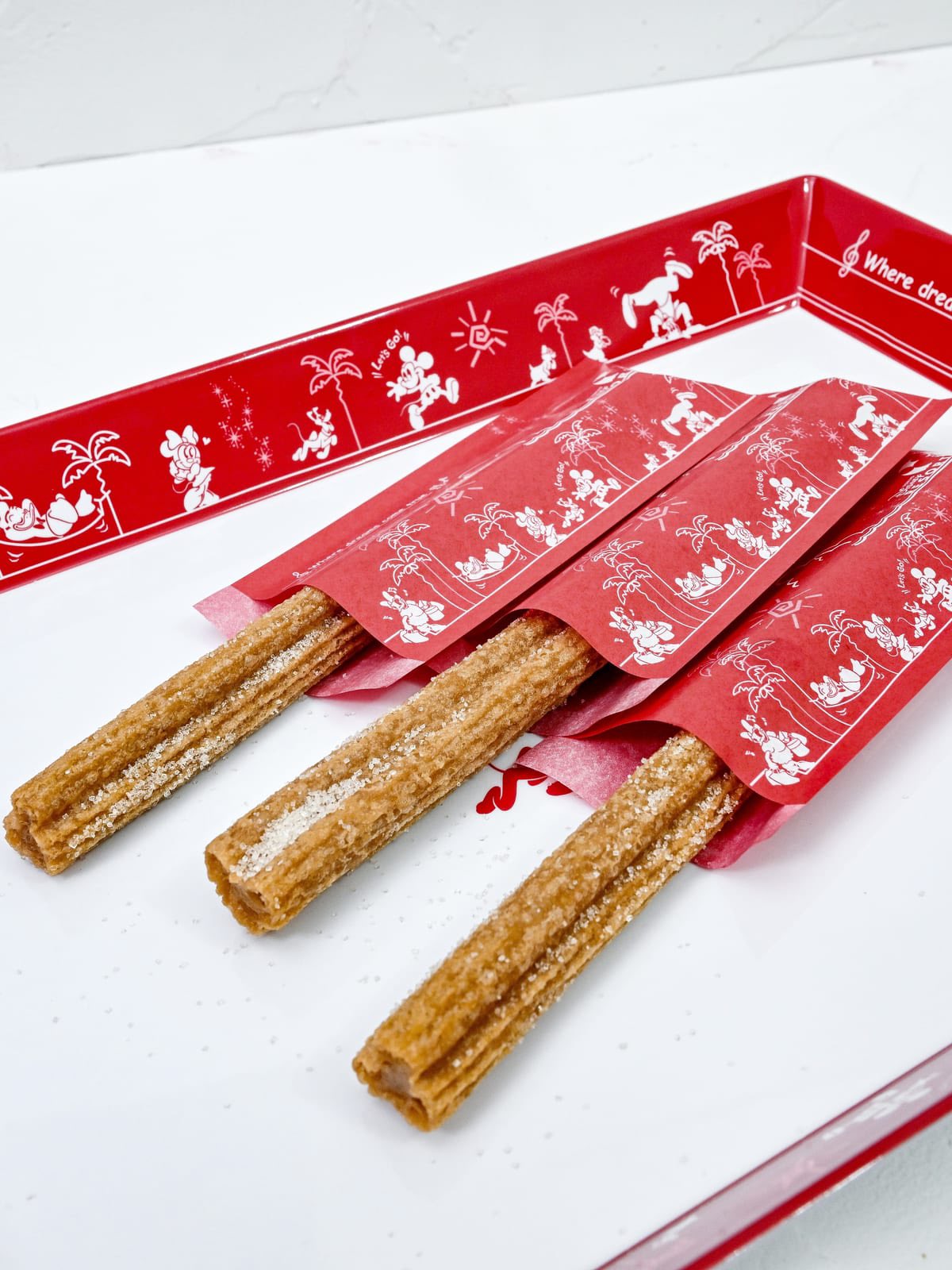 Mezzomikiのディズニーブログ ミッキーチュロス シナモン ベーコンとパイナップルのピザ 東京ディズニーリゾート フローズンセレクション 明日6月23日から 期間限定 組み合わせ自由 2個以上購入すると送料無料に 対象期間 6月23日 8月31日