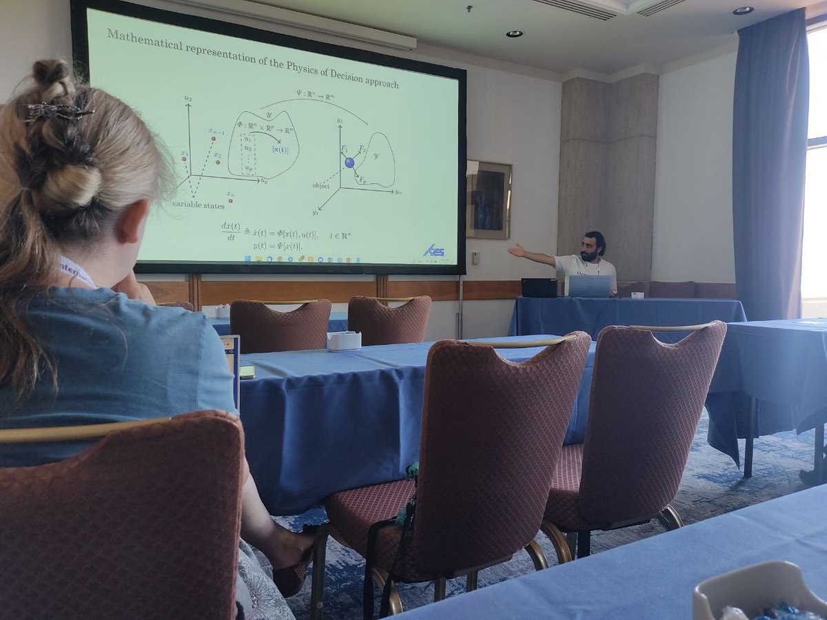 FBenaben's tweet photo. @NafeMor presenting his work on physics of decision #POD @KESintl KES-IDT #Rhodes #Greece #SunandScience. A physics inspired vision of performance mgt and decision making based on forces and trajectories. Great perspectives @BenMontreuil @GeorgiaTechISyE @IMTMinesAlbi @LabSIReN https://t.co/6cCrmH6vvI