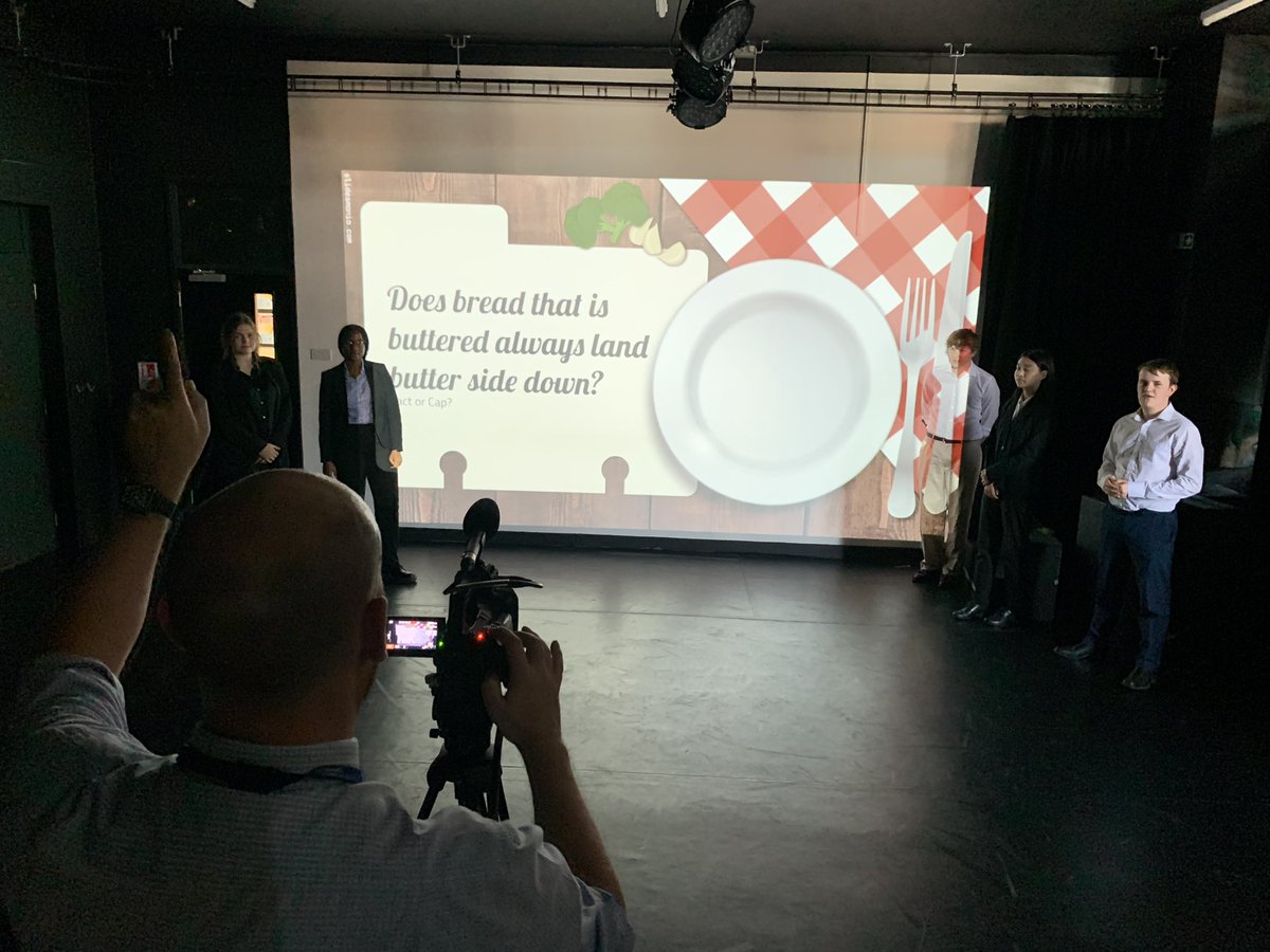 enrich_ed's tweet photo. ‘Does bread that is buttered always land butter side down?!’ Head of Science Mr Cathro directing the final @iborganization Group 4 Science presentations #STEM @KESWitley https://t.co/UNvjjbiRQY