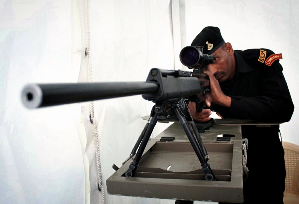 iamward0g's tweet image. A NSG commando with PSG 1A1 sniper rifle.