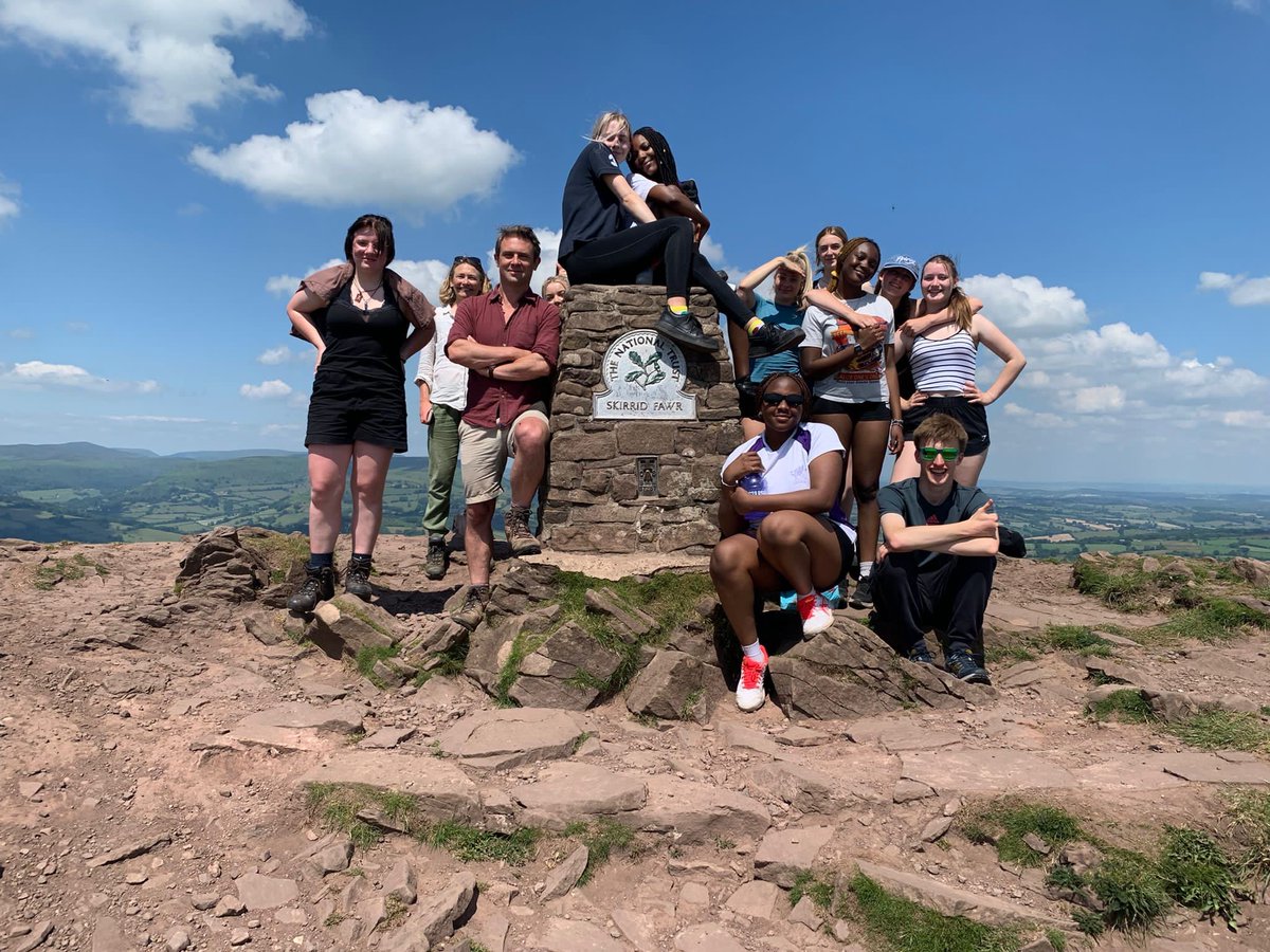 WycliffeHead's tweet photo. It doesn't get much better than this!  Y12 @WycliffeCollege English Literature pupils on Skirrid Fawr with @owensheers himself to talk about his poem (of the same name as the place) from his Skirrid Hill collection.  What a day for it !  Hard to think of a better 'classroom' ... https://t.co/KpHs2drPCe