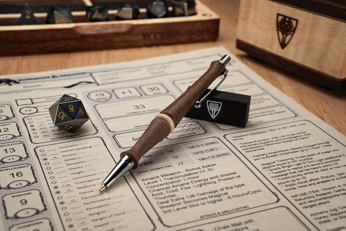 ⭐ BIG Giveaway ⭐ We're giving away our 'Artificer' class-themed set. This includes a Master Vault, Rolling Tray, AND Mechanical Pencil, crafted from Figured Maple and Black Walnut. 🛠 (Rules posted below 👇) #WyrmwoodWednesday #dnd #giveaway #dice