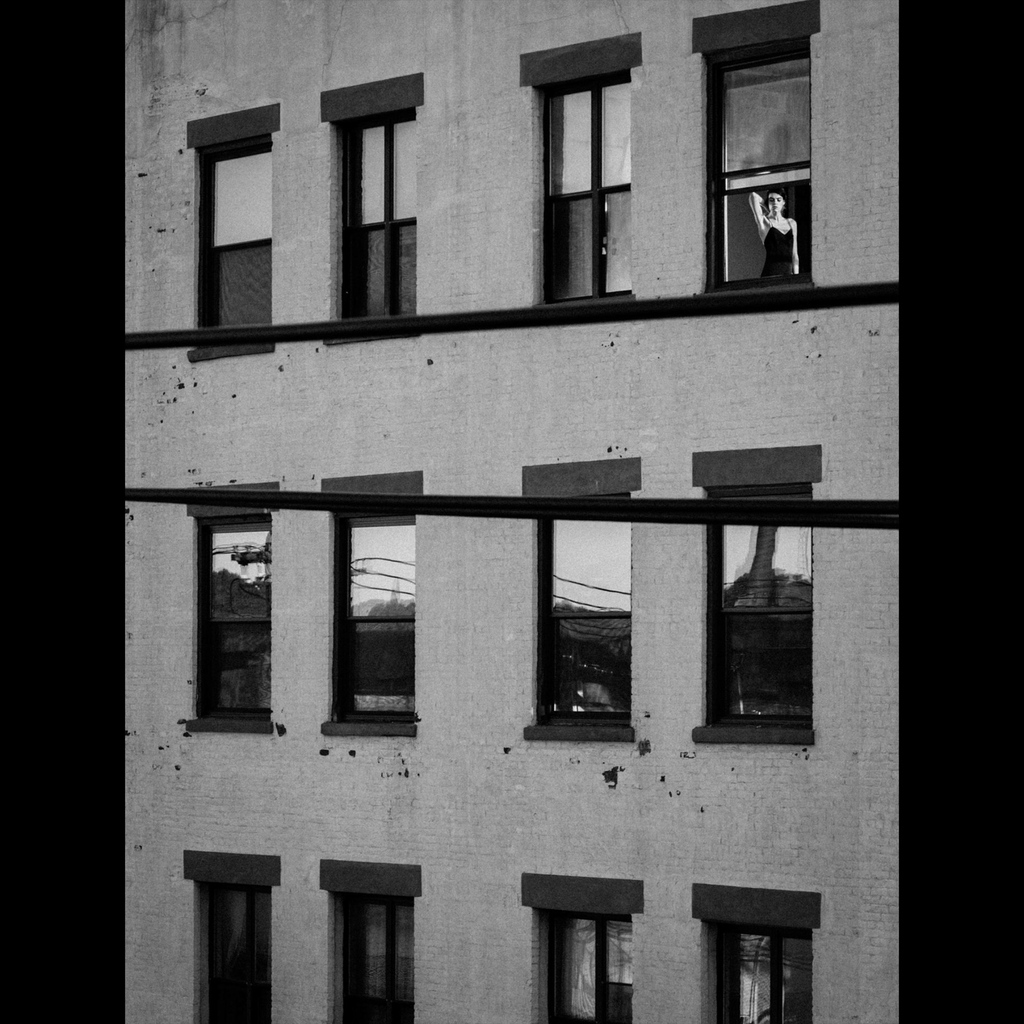 An old favorite, I shot this from a neighbors roof, into my own apartment, of Hallie Hutchinson almost 10 years ago