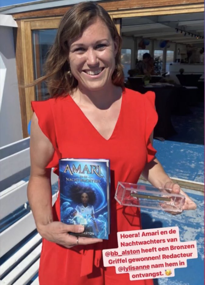 My brilliant editor, @Lytje from HarperCollins Holland accepting the Bronze Griffel Award for Amari!