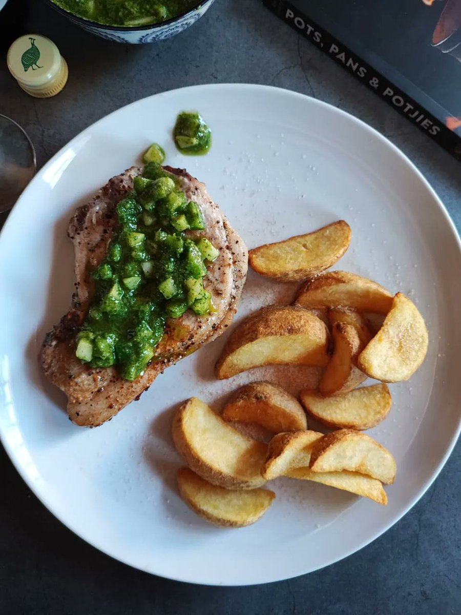 Boozy_Foodie's tweet photo. Another @BeerCountrySA "Pots, Pans &amp; Potjies" recipe!  This time, #smulpape made the "Dry-Brined Pork Chops with Jalapeño and Pear Chimichurri.  Ridiculously tasty! 
🔥 and 📸 by @smulpape
"Pots, Pans &amp; Potjies" published by @PenguinBooksSA 
#SouthAfricanCooking #roeliareads https://t.co/2Q45c8L0kk