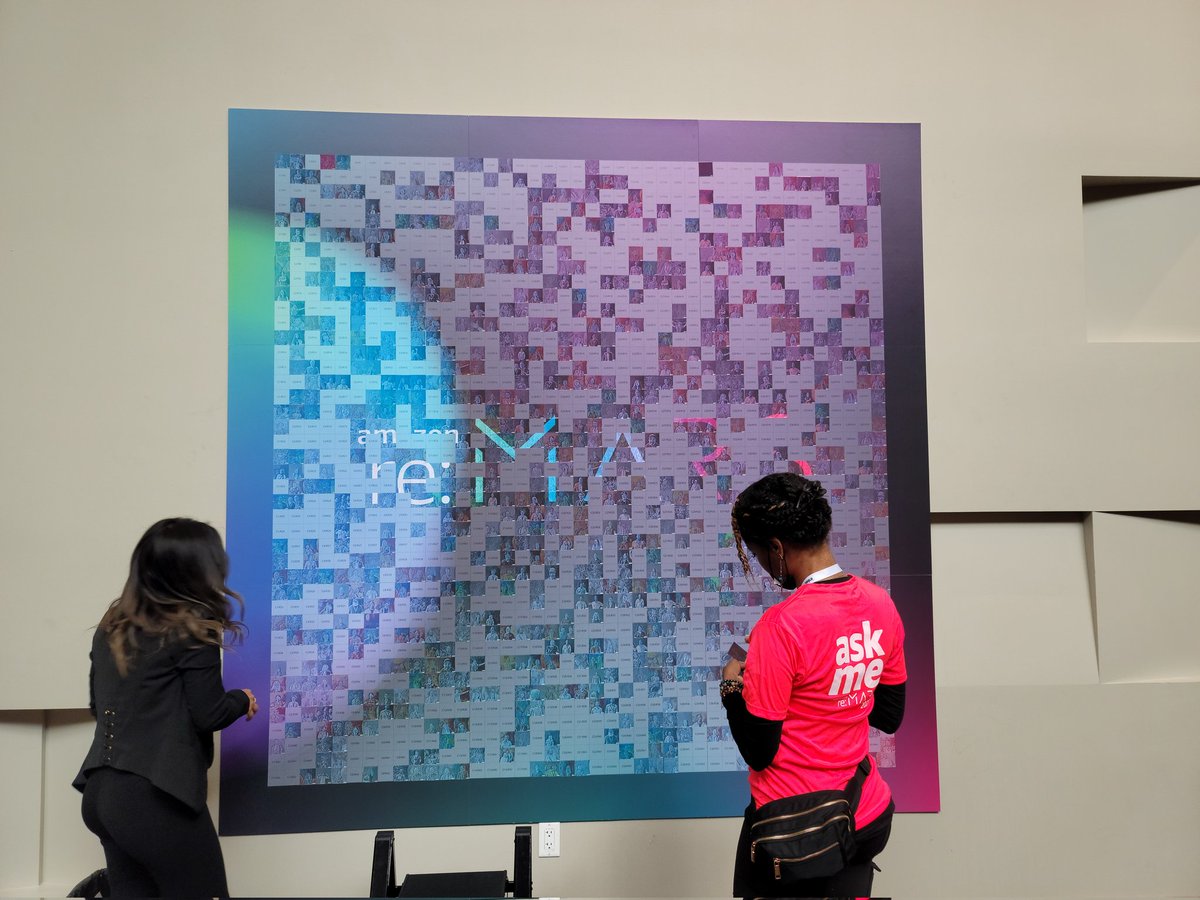 Visiting the #AWSArts  booth at #reMARS called Step Into A Masterpiece great work <a href="/skrinak/">skrinak</a> and Rumi Olsen! It builds a mosaic they assemble over time of all the pics taken using AI models.