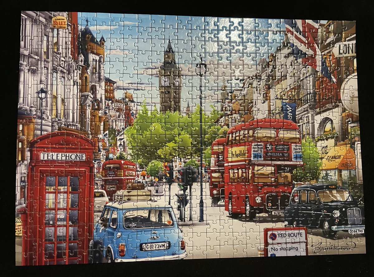 Todays jigsaw completed ,it’s called London Street . #jigsawpuzzle #londonstreet #telephonebox #londonbuses