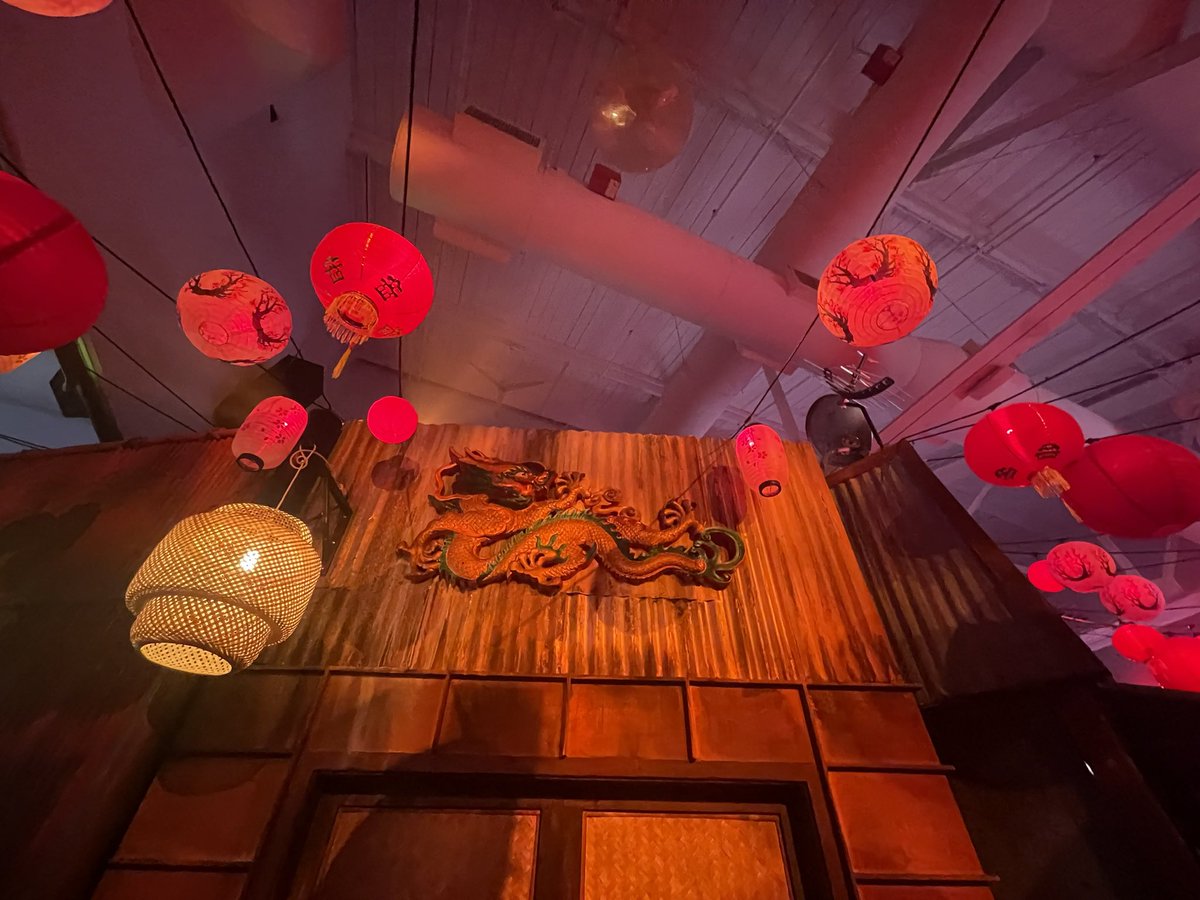 punk9059's tweet photo. Azuki event is a space transformed into a legit museum. With a tattoo parlour. Pretty dope. Much more diverse crowd than the other events I’ve been to. https://t.co/SVVRrzO24d