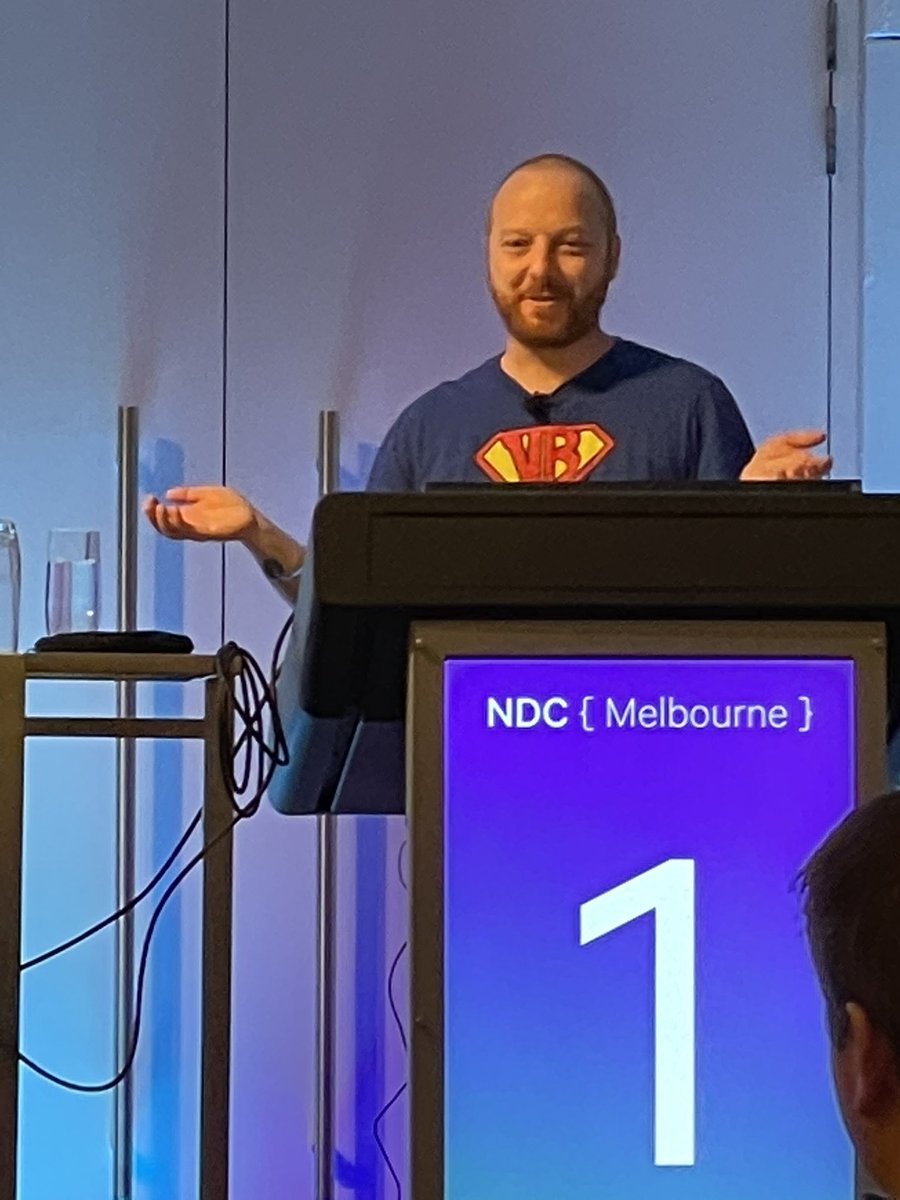 Who wears a Visual Basic shirt while giving a talk about C# at #NDCMelbourne? <a href="/davidwengier/">davidwengier@aus.social</a> does.
