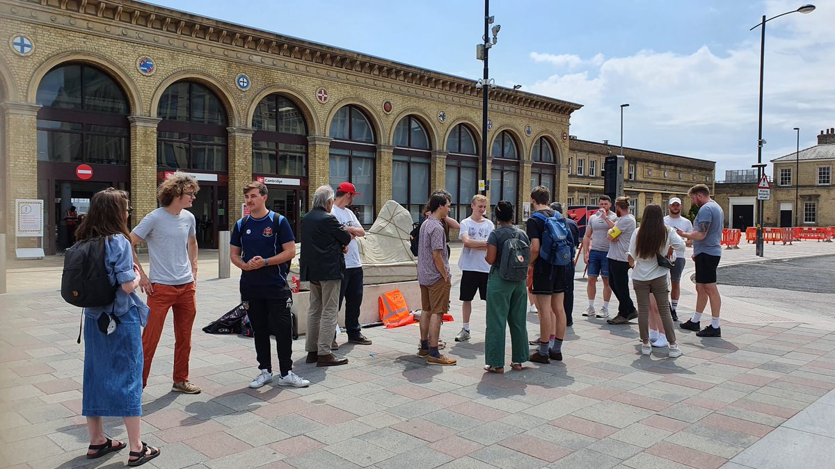Fergal_H's tweet image. A crossover of @CambridgeUCU's #j4cs campaign, @CamDefendEd and @RMTunion at Cambridge station. Union solidarity is always such a boon on picket lines. Also great to see @ASLEFunion action bringing Cambridge to a near stand still