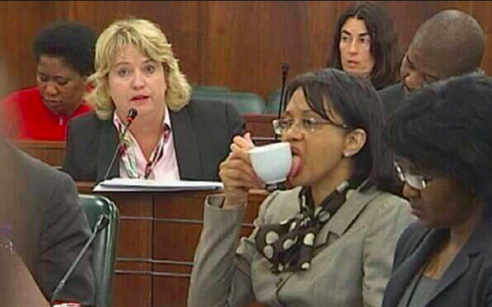 CrazySAPol's tweet photo. Minister of Energy Tina Joemat-Pettersson licks her teacup in Parliament. https://t.co/xH3ffRkWgu