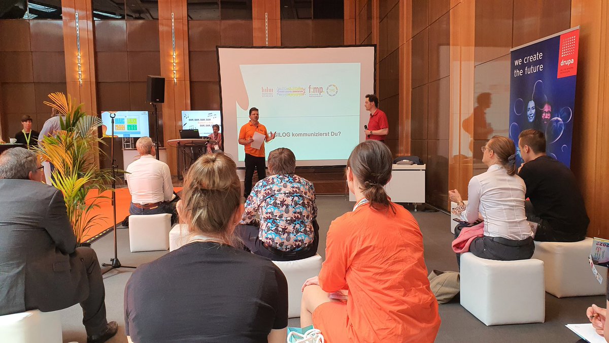 drupa's tweet image. Rüdiger Maaß, CEO, @fmp_redaktion and Michael Adloff, CEO, Theissen Medien Gruppe GmbH start their session in Forum Stadthalle at #PrintDigitalCon with the title &quot;How DIGILOG do you communicate?“.