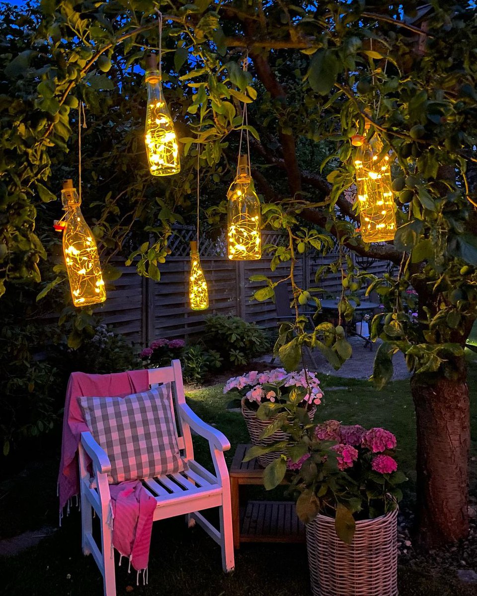 What would you use to create an outdoor chilling spot for yourself? Petra @payton_mno choose our cork lights to produce the magical highlight. 🍾✨#koopower #fairylights #NightSky #Garden #Tree #flower #chair #fence #Grass #Plant #light #outdoorliving #platio #SummerVibes