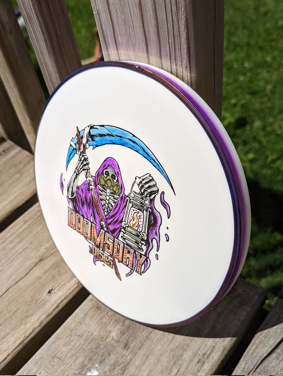 ABottDG's tweet photo. Painted my new @DoomsdayDG Landmine (Still in testing) this morning. 
Thing flies like a champ and though the stamp was sick to start I also like it with a little color!
#discgolf
#discdyeing
#discdye
#TeamDoomsday https://t.co/c5fUlUqRSF