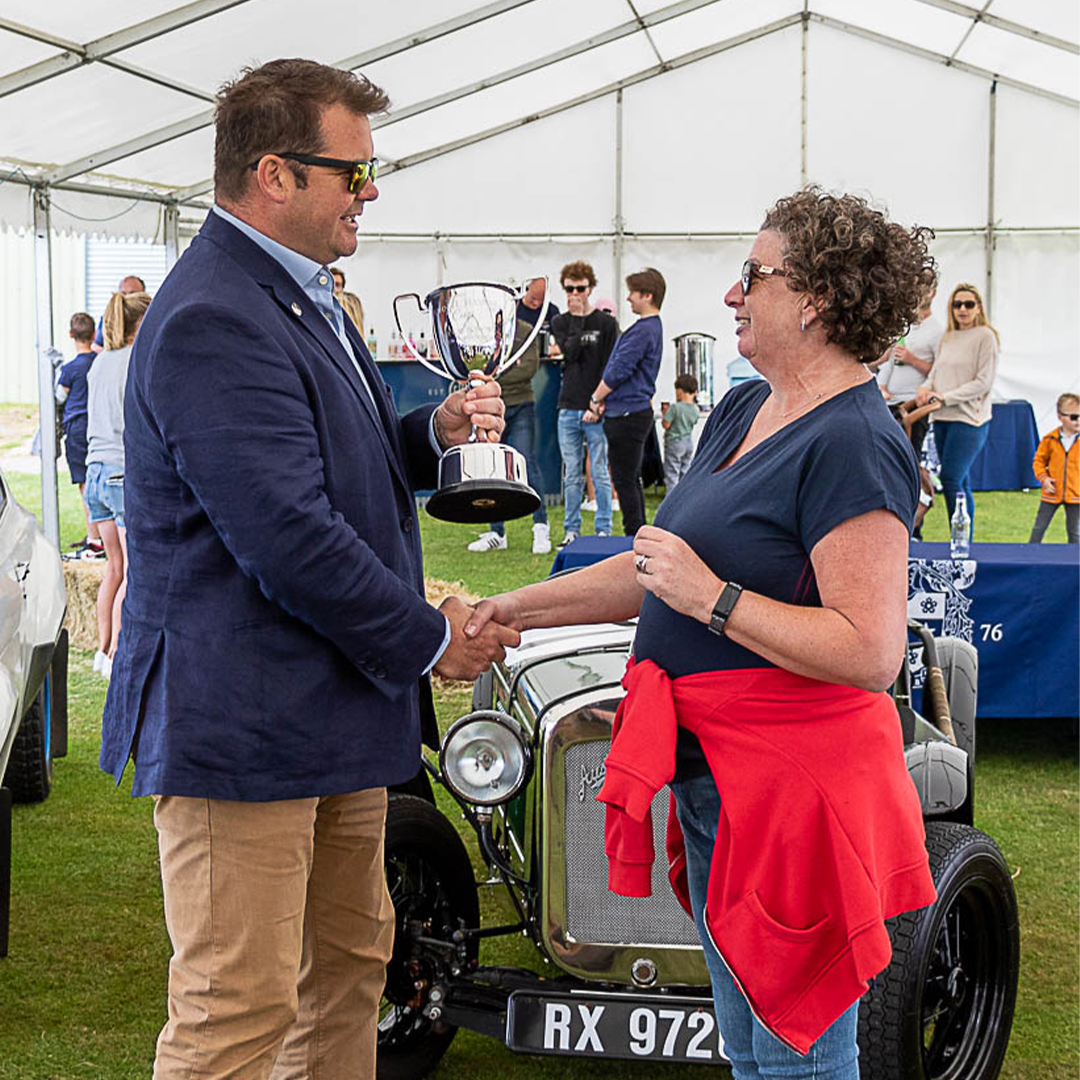 HaynesMuseum's tweet photo. On Sunday 19th June our Chair of Trustees, Christopher Haynes, was invited back to his and John Haynes' old school, to judge the “John Haynes Best in Show Cup” at the Sutton Valence School Car Show. Chris awarded the Cup to a 1966 Jaguar E-Type S1 4.2ltr owned by Marie Clarke. https://t.co/C1rZswdJ0z