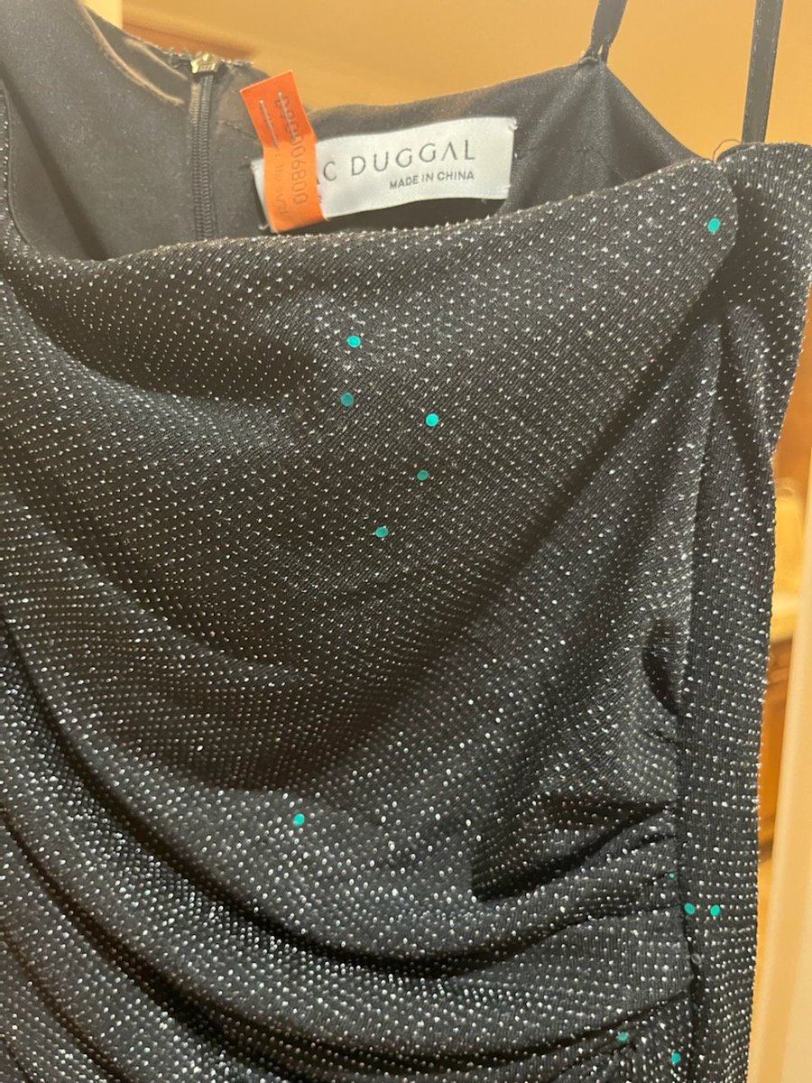 kimamarshall11's tweet photo. @Nordstrom customer service is terrible.  I purchased a green sequined @macduggal dress in first picture ($430).  Wore it, dry cleaned it, and got a black dress with no sequins back (also pictured).  Nordstrom will not make it right.  Beware. https://t.co/YUbiWsG0fk