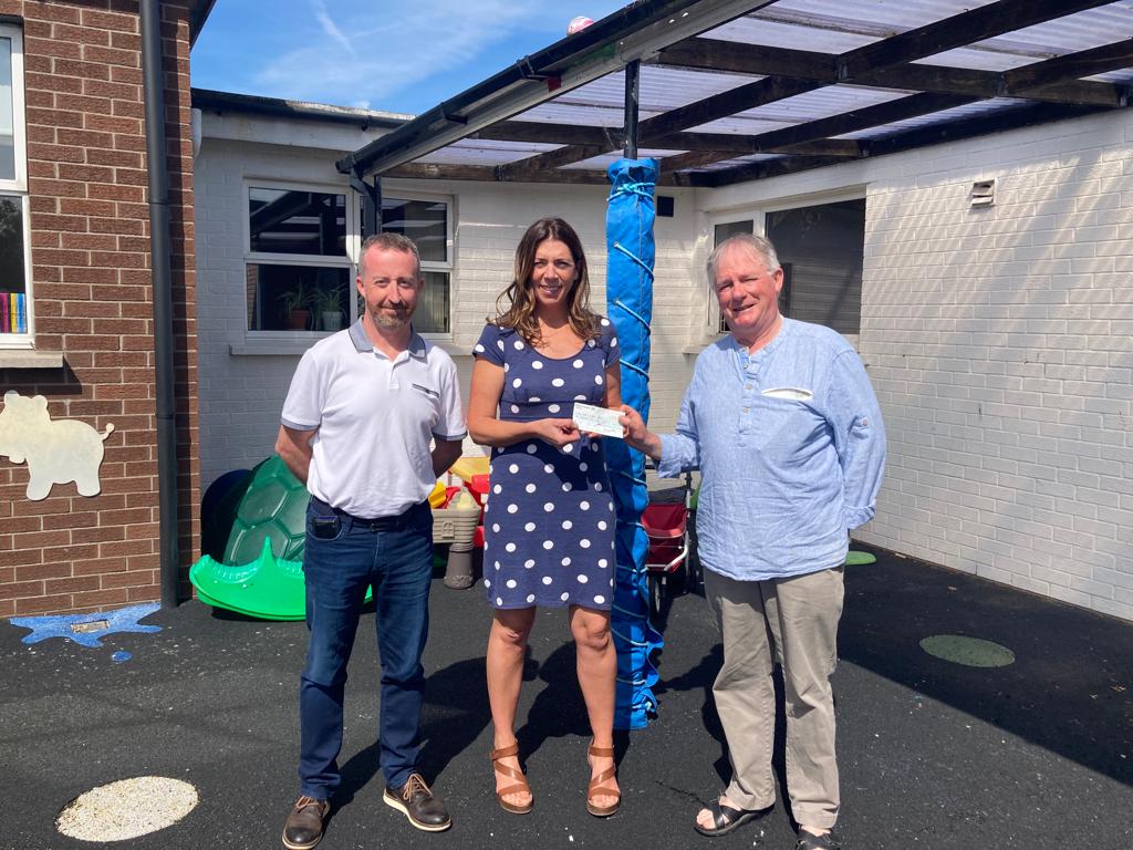 FatimaSchool4's tweet photo. A big Thank you to Terry Whitty Chairperson and Ian Barry Treasurer of our Parents Association here  presenting Principal Glenda McKeown a cheque donation for €10000 for the refurbishment of the Junior Playground.  A big Thank You. https://t.co/dv5G54C9i7