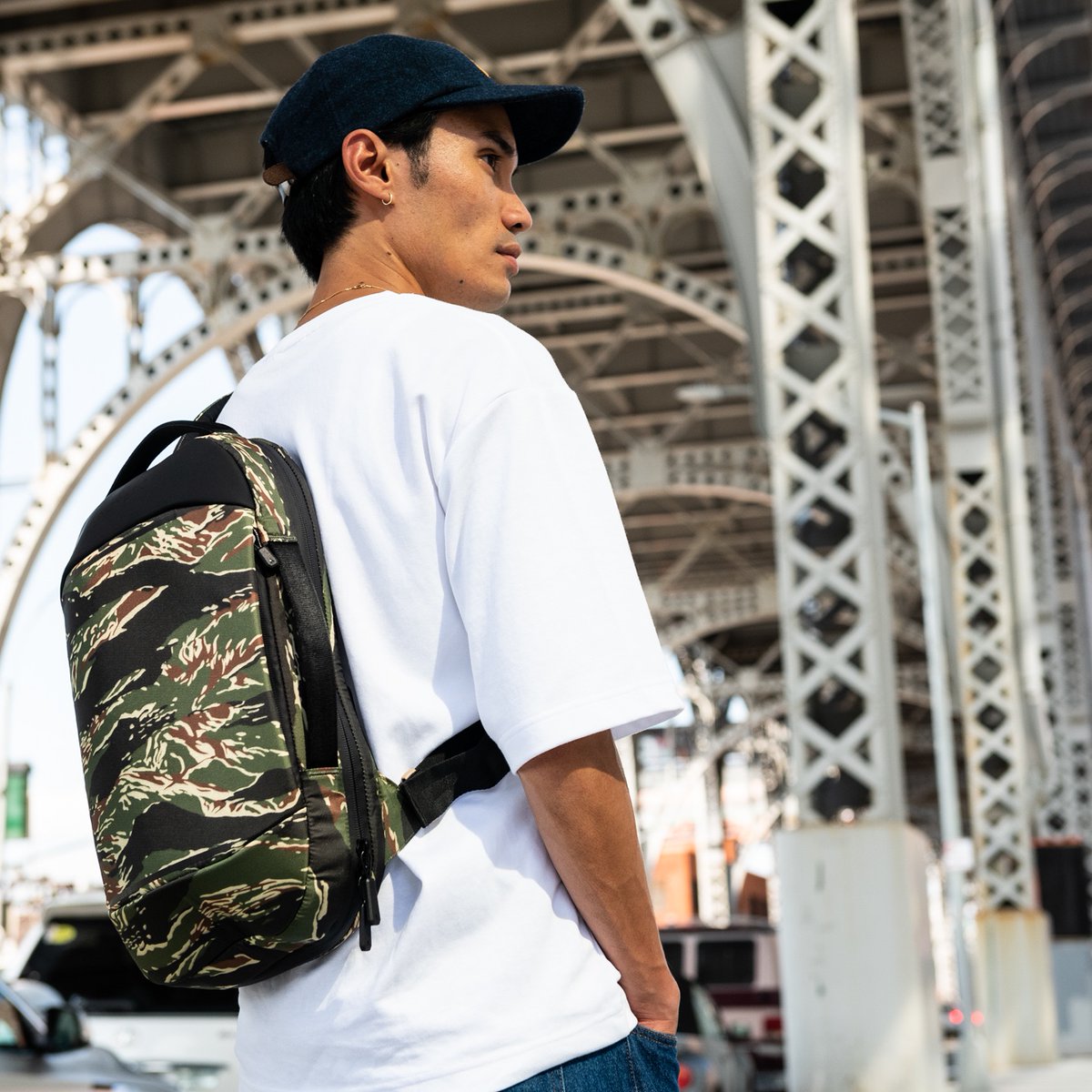 Nomaticgear's tweet photo. It's new, it's wild, it's here! Introducing our newest limited edition colorway, the TIGER STRIPE collection. A wild twist on our most popular gear, including our Wallet and the all-new Bucket Hat.

Shop the limited Tiger Stripe collection here: https://t.co/d3XsJnFEYx https://t.co/SMiofL9ZpJ