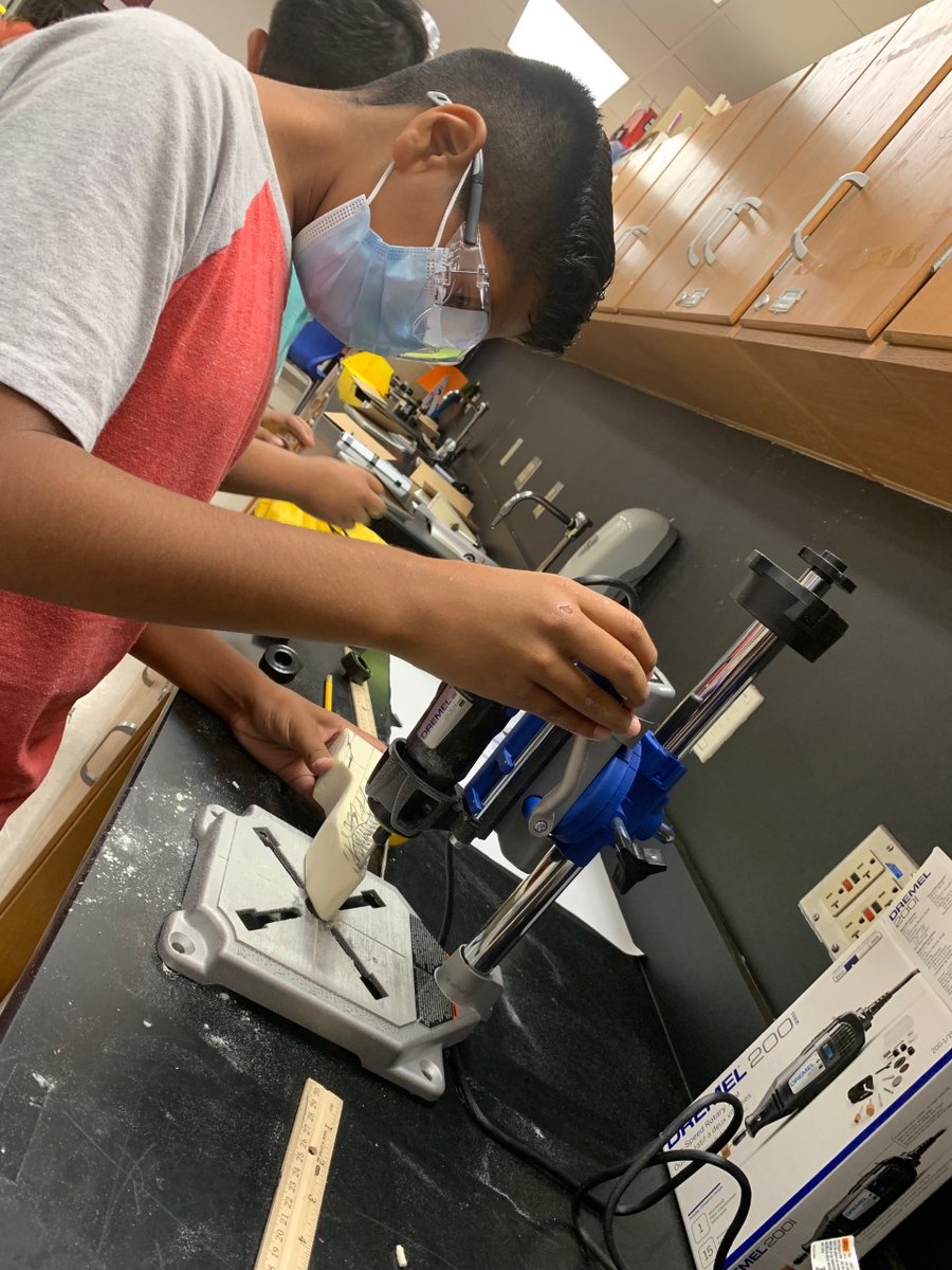 SAISDCTE's tweet photo. Middle School SMART Campers are gearing up for #CO2Car Race Day! Students measured the mass of their #FusionBlocks and shaped their cars for maximum aerodynamics!  Way to go students! See you at the races tomorrow! @TafollaToros #LowellMS @harrishawksib @SAISD https://t.co/aXhQozwS2W