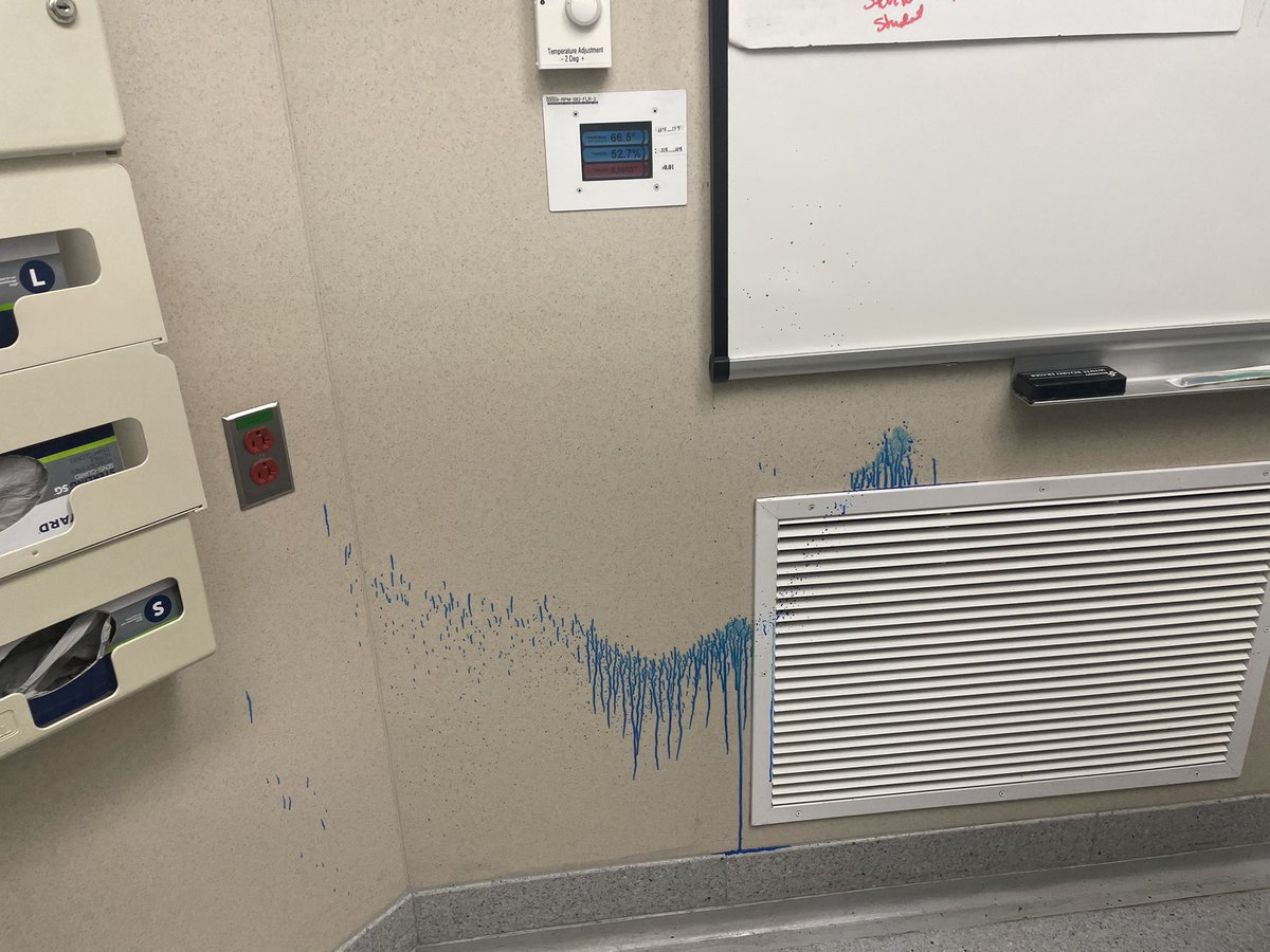 in reality, my OR nurse accidentally sprayed methylene blue on the wall. In my mind, I stumbled upon a crime scene involving a Smurf. @MichaelHorseyMD saw the scene unfold