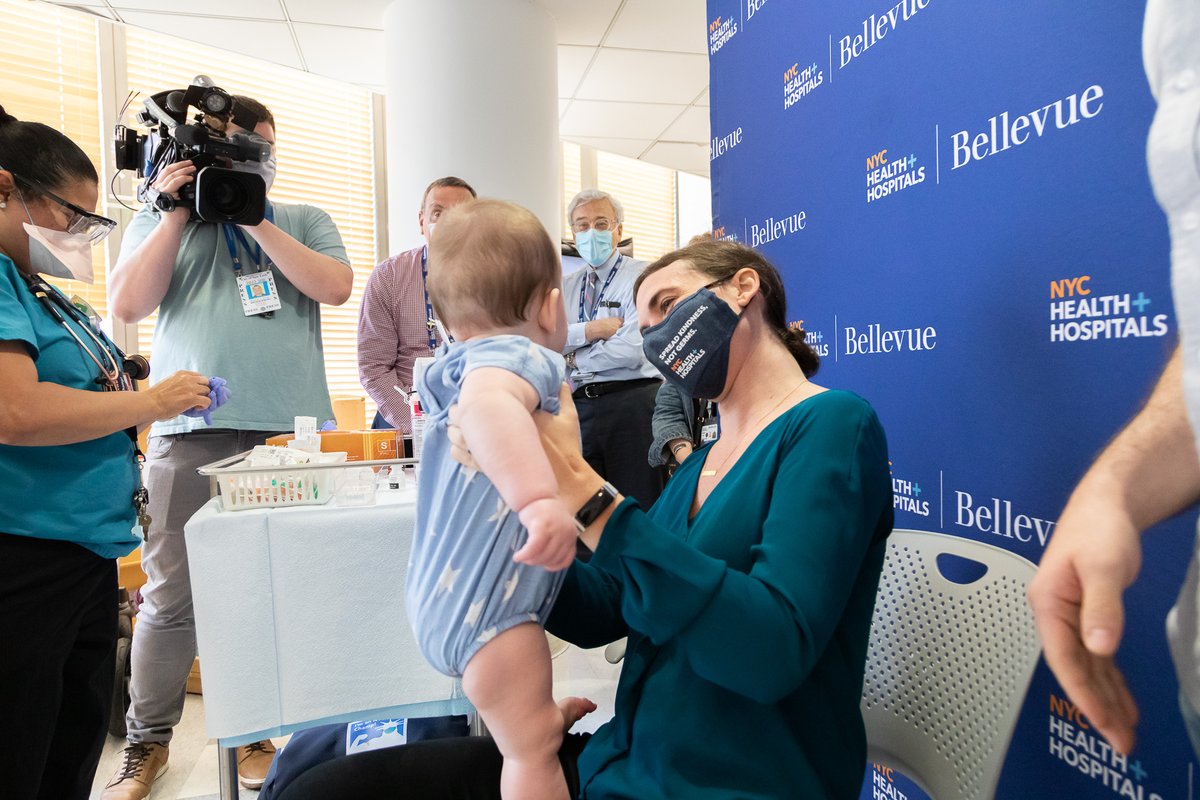NYCHealthSystem's tweet photo. What a monumental day at NYC Health + Hospitals @BellevueHosp as we gave out our first #COVID19vaccine to an infant/toddler ages 6 months to 4 years! Our AVP of Ambulatory Care @hjacksonmd brought her 9-month-old daughter to get vaccinated. Learn more: https://t.co/8tc9cJwwGG https://t.co/rFVBaLavSJ