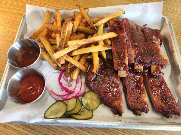 HappyBasset's tweet photo. What better way to cheer up on this rainy day than with a refreshing craft beer and wood smoked ribs?! Starting at 5pm we'll have our spare ribs available for $12-$30 depending on the size purchased. We also have smoked Chicken Thighs for $10! #CraftBeer #BBQ #Local #brewery https://t.co/GjVmsypwXa