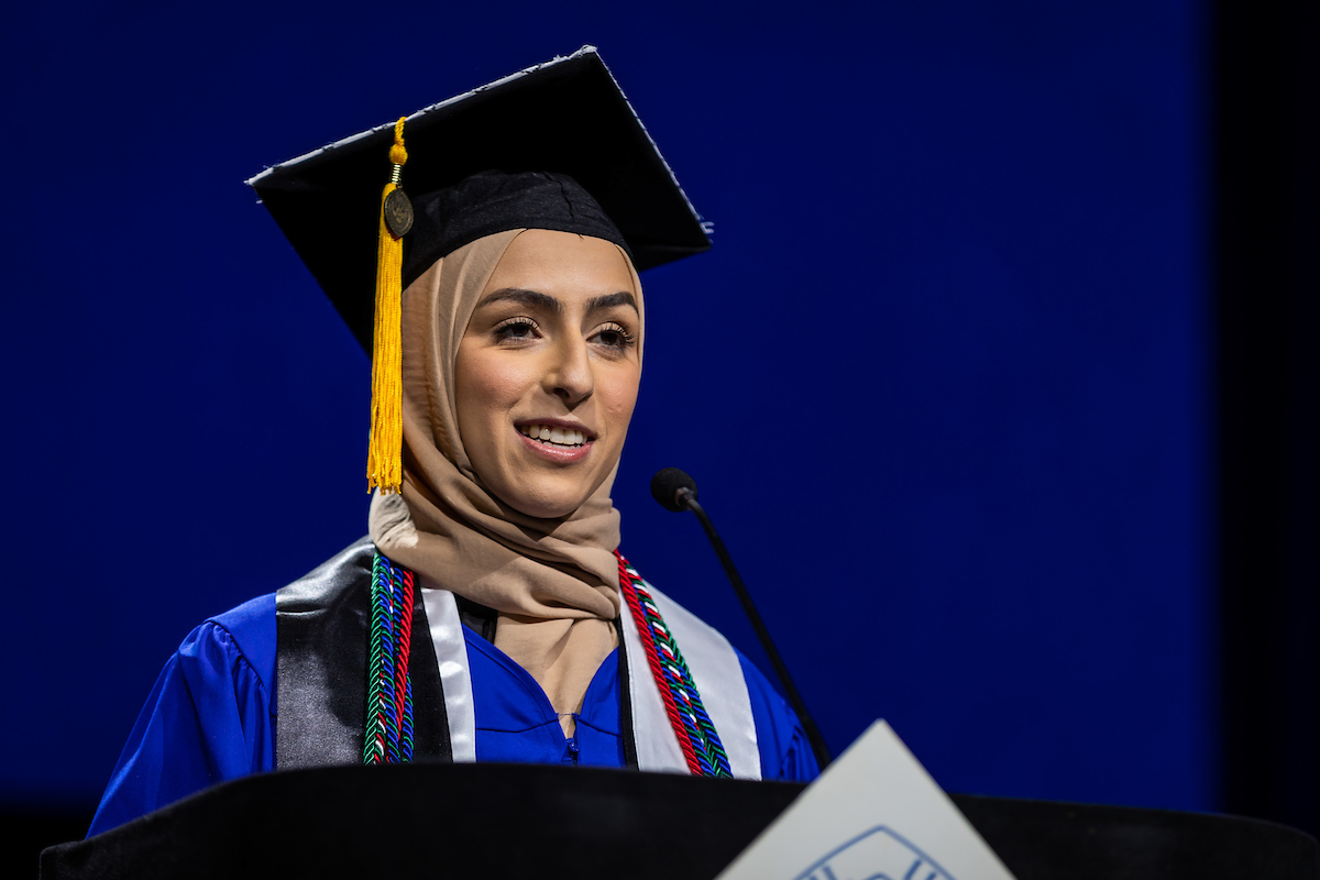 DePaul_News's tweet photo. Watfae Zayed spoke @DePaulCSH &amp; @DePaulSOM commencement today: 

“DePaul University gave me, and many other students, a safe space and the opportunity to be comfortable in our identities despite the world outside of our campus,” Zayed said. #depaulgrad2022 
📷by Jeff Carrion https://t.co/n2E7DUEEE7