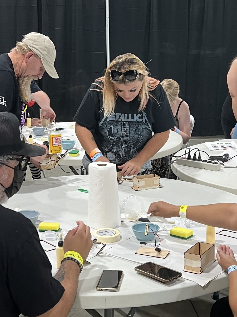 ParksAndCons's tweet photo. The @haunt_x DIY workshops are pretty great. Attendees are currently working on the Ghost Box Following Eyes to take home #HauntX https://t.co/i5Pp6oppAc
