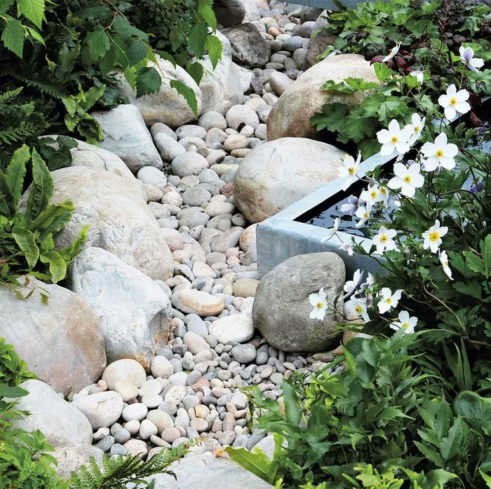 HomesRutter's tweet photo. Do any of these river rock #landscaping ideas appeal to you? #hometips  https://t.co/7oJmOOUvu0 https://t.co/dI2FYPht2e