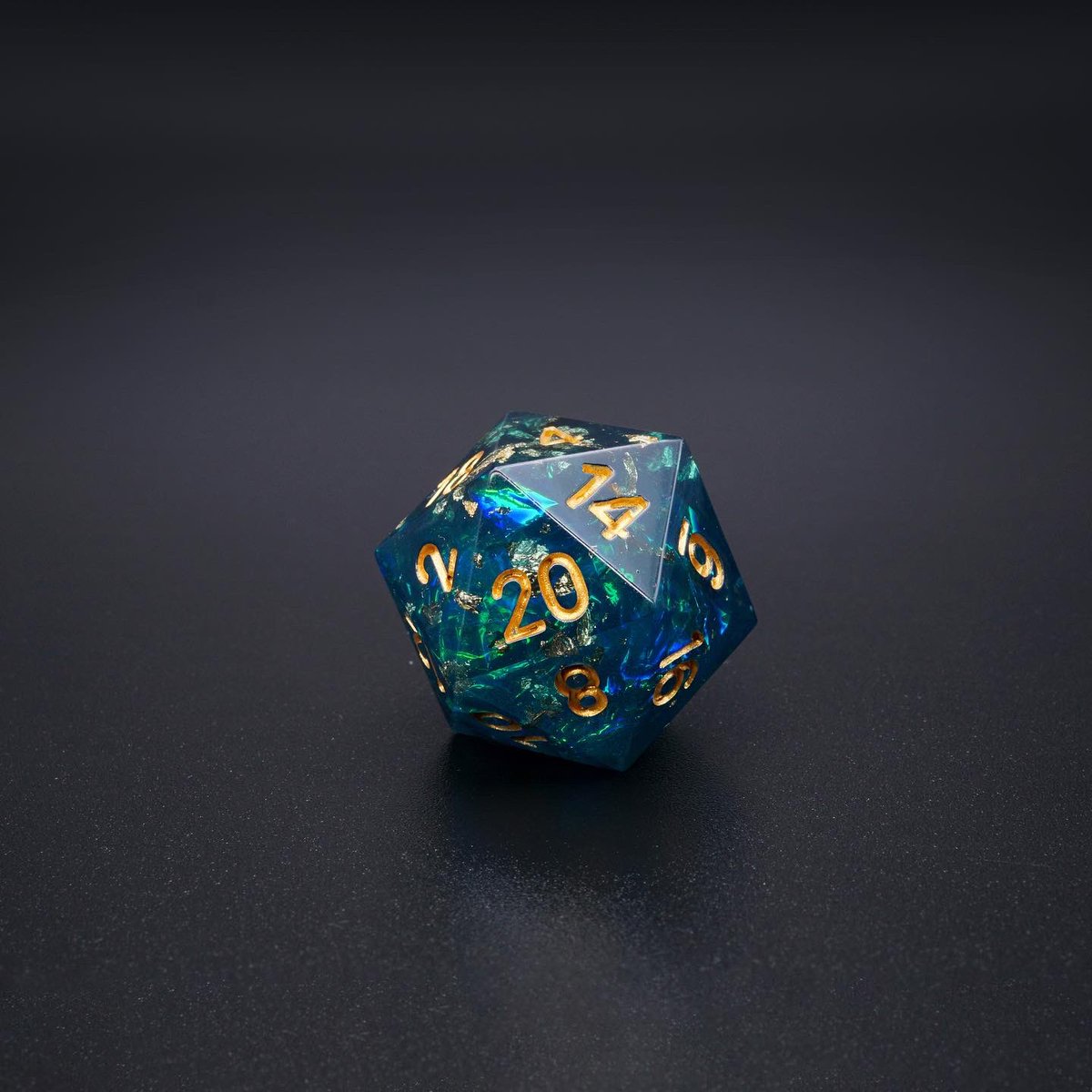 runefoundry's tweet photo. "The essence glistened underwater as I kneeled to drink. Happening upon the material was pure luck during a dangerous journey, but these resulting tools were forged deliberately and with great care," remarks Grimmoth. The corner of his lip turns upwards in a smile.

#dice #dnd https://t.co/J6Rv3wmgcc