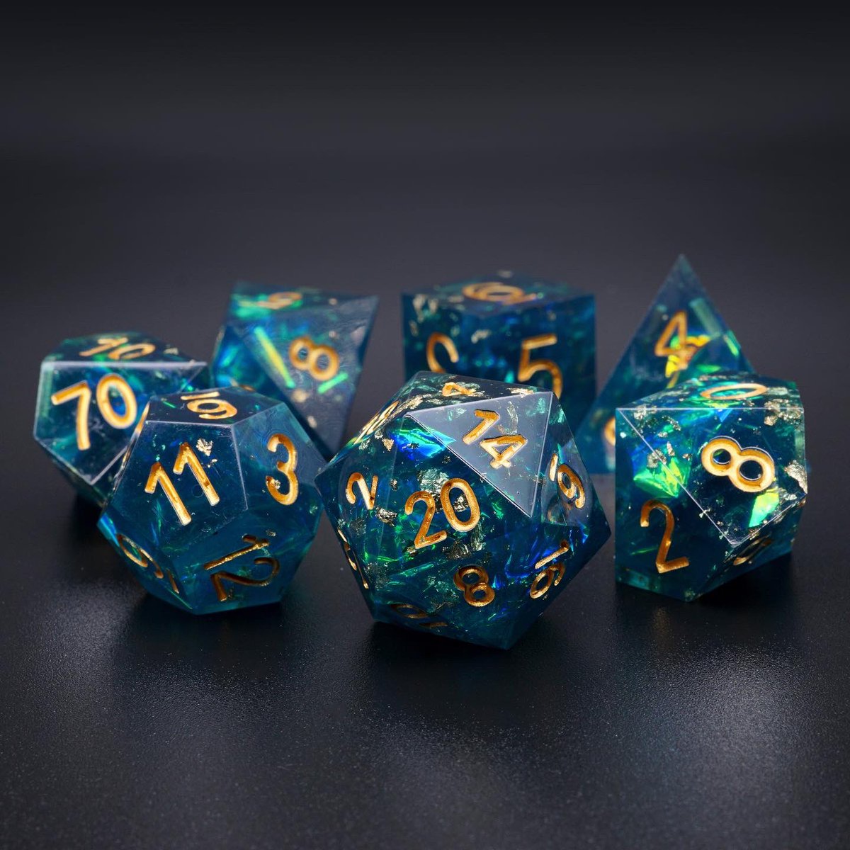 runefoundry's tweet photo. "The essence glistened underwater as I kneeled to drink. Happening upon the material was pure luck during a dangerous journey, but these resulting tools were forged deliberately and with great care," remarks Grimmoth. The corner of his lip turns upwards in a smile.

#dice #dnd https://t.co/J6Rv3wmgcc
