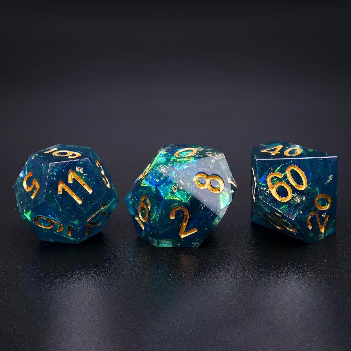 runefoundry's tweet photo. "The essence glistened underwater as I kneeled to drink. Happening upon the material was pure luck during a dangerous journey, but these resulting tools were forged deliberately and with great care," remarks Grimmoth. The corner of his lip turns upwards in a smile.

#dice #dnd https://t.co/J6Rv3wmgcc