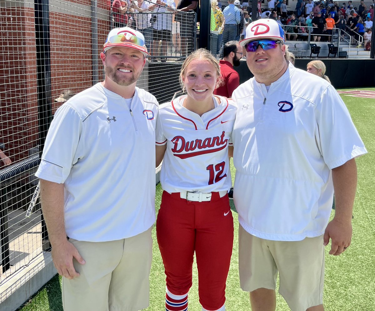 Durant 's Cody Little of the Lady Lions (left) was the head coach of the Large East squad at today's OHSFCA all state softball game which included Abi Gregory (center). Cody's former assistant and current DHS varsity baseball coach Derrick Haworth (right) was also on hand to help