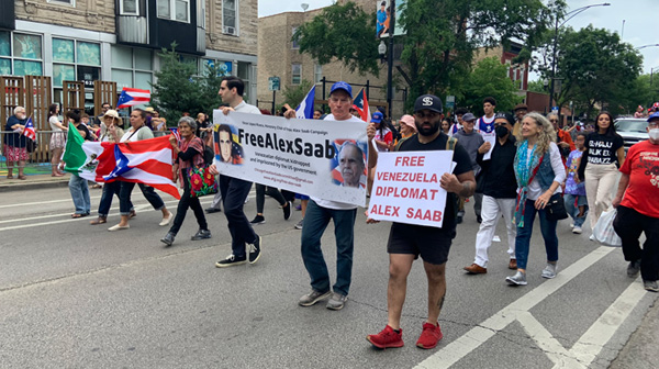 We were here today at the Puerto Rican People's Day Parade in Chicago, marching in the #FreeAlexSaab contingent.