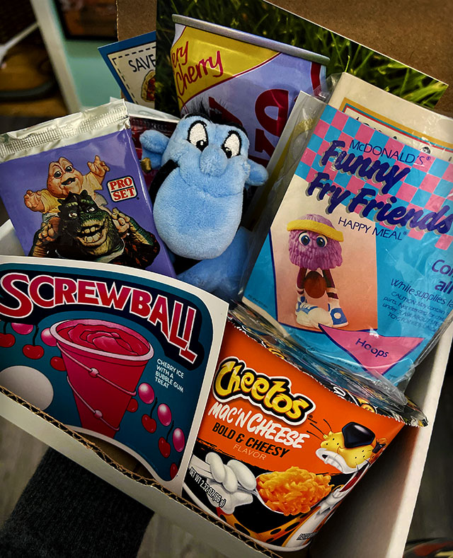 DinosaurDracula's tweet photo. Dino Drac's June Funpack is here! Get yourself a big box of nostalgic summertime nonsense, while supplies last! https://t.co/kk99rv8BpE https://t.co/UM6dKRVlQh