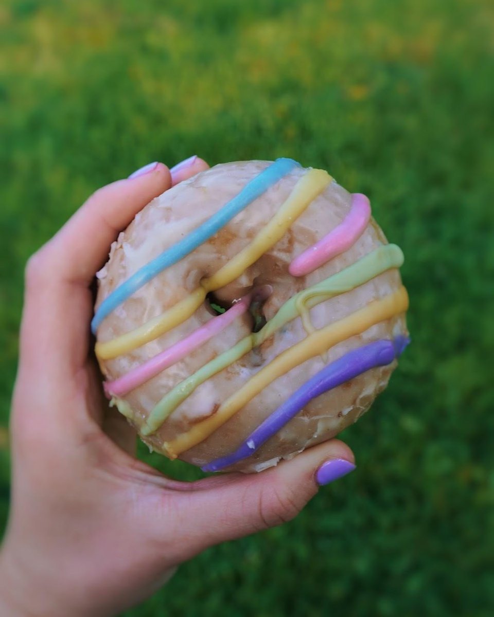 MightyODonuts's tweet photo. Celebrating all month long! who's given our Pride donut a taste? #PrideDonut #SeattleTreats https://t.co/YEW0fYIw5E