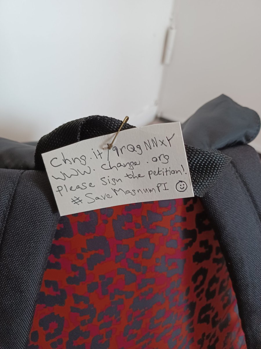 Back2Future21's tweet photo. @MagnumPIpodcast The billboard in Times Square was awesome. Really was!😍👍 Following on from that had idea we could make our own labels and attach to a bag.This my work one. Or clothing/luggage.A cheap but good way to get new peeps to notice our campaign?😄🌴✌ #SaveMagnumPI https://t.co/3VolxoQWr7