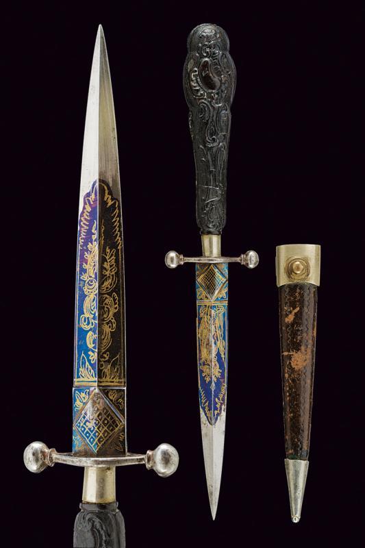 Ornate dagger with gold engravings and blued blade, European, 1700s. 